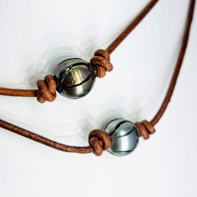 "Lotus Tattoo" Necklaces - Carved Tahitian Pearls, Leather