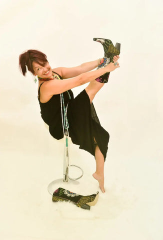 Artist Owner Barb Grob Poses for an Instore Magazine Photo Shoot