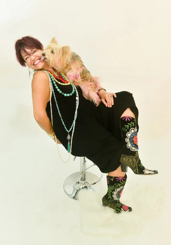 Artist Owner Barb Grob Poses for an Instore Magazine Photo Shoot