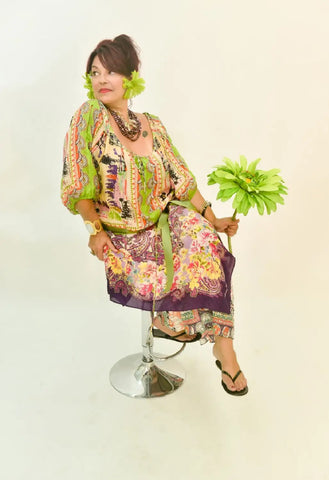 Artist Owner Barb Grob Poses for an Instore Magazine Photo Shoot