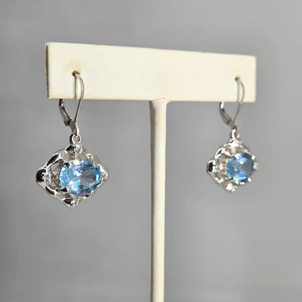 ?BEautiful Blues’ 1.25’’ Earrings - Topaz Sterling Silver