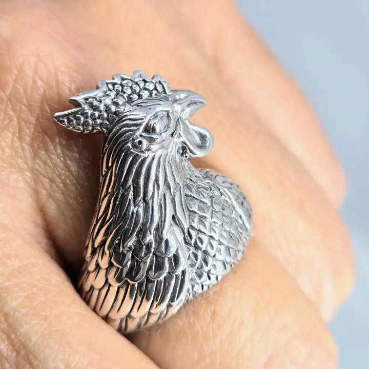 ?BIg Fat Cock-face’ Adj. Sz Ring - Sterling