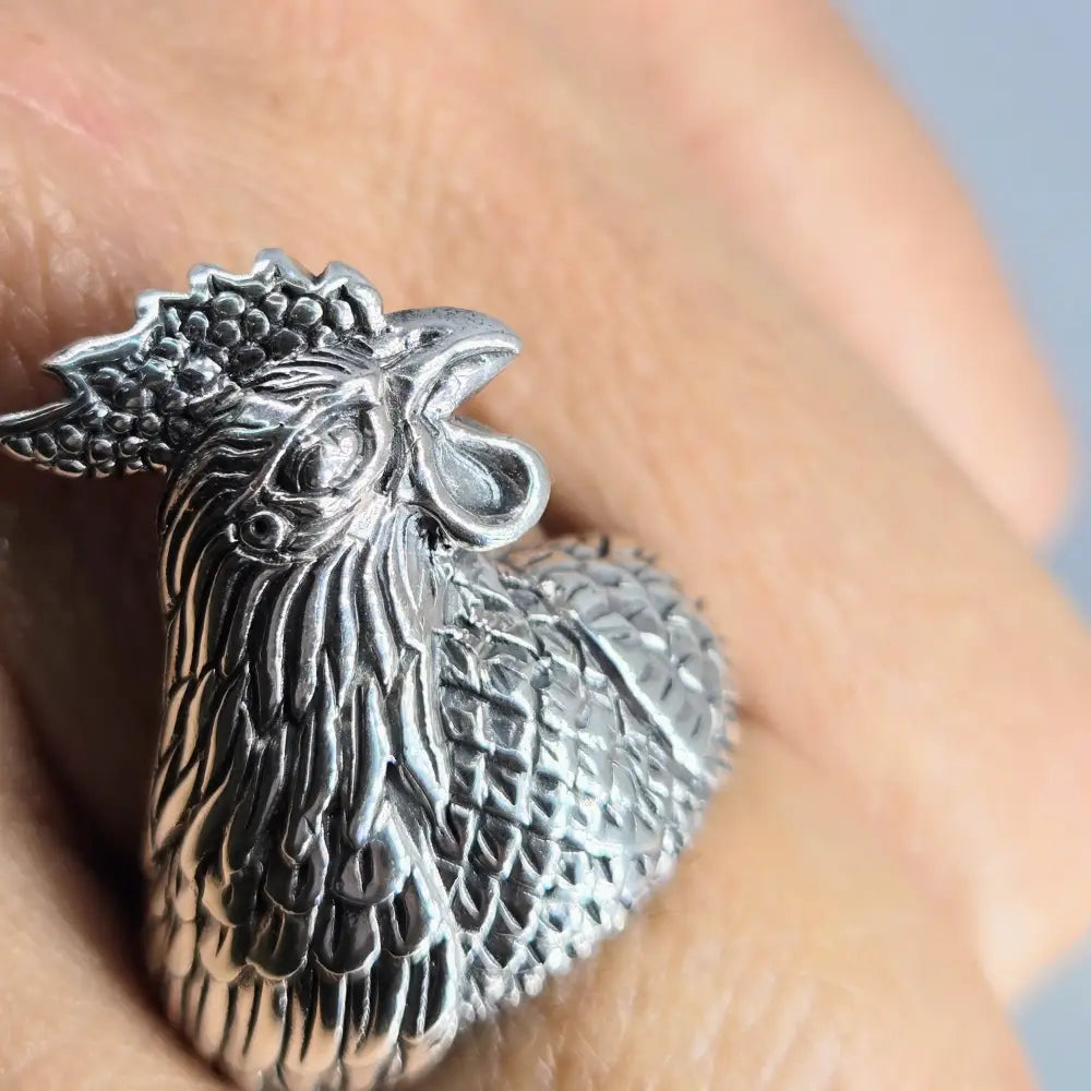 ?BIg Fat Cock-face’ Adj. Sz Ring - Sterling
