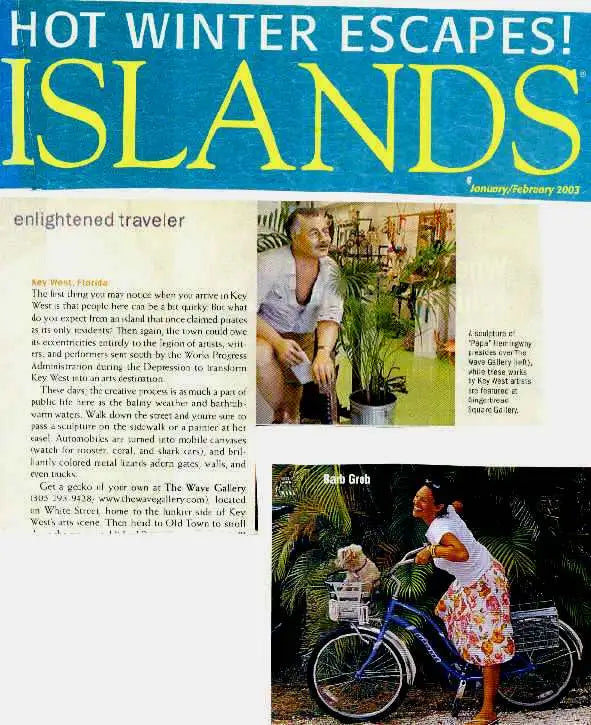 Blue bicycle with a white basket carrying a small dog