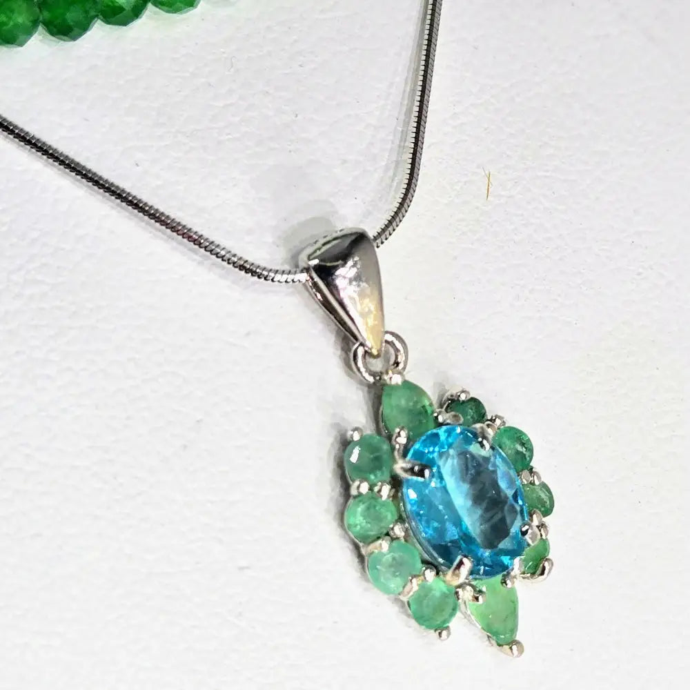 ?CAribbean Dreams’.75’’ Pendant Necklace - Paraiba Blue Topaz & Emerald Anti-tarnish Sterling