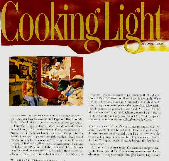 The main object in the image is a vintage-style magazine cover for cooking light, december 2003.