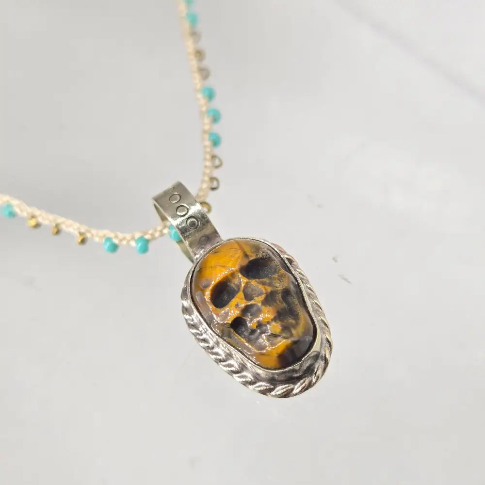 ?SKull Candy’ Hand-carved Tiger’s Eye Skull Pendant Necklace - Key West Local Luxe