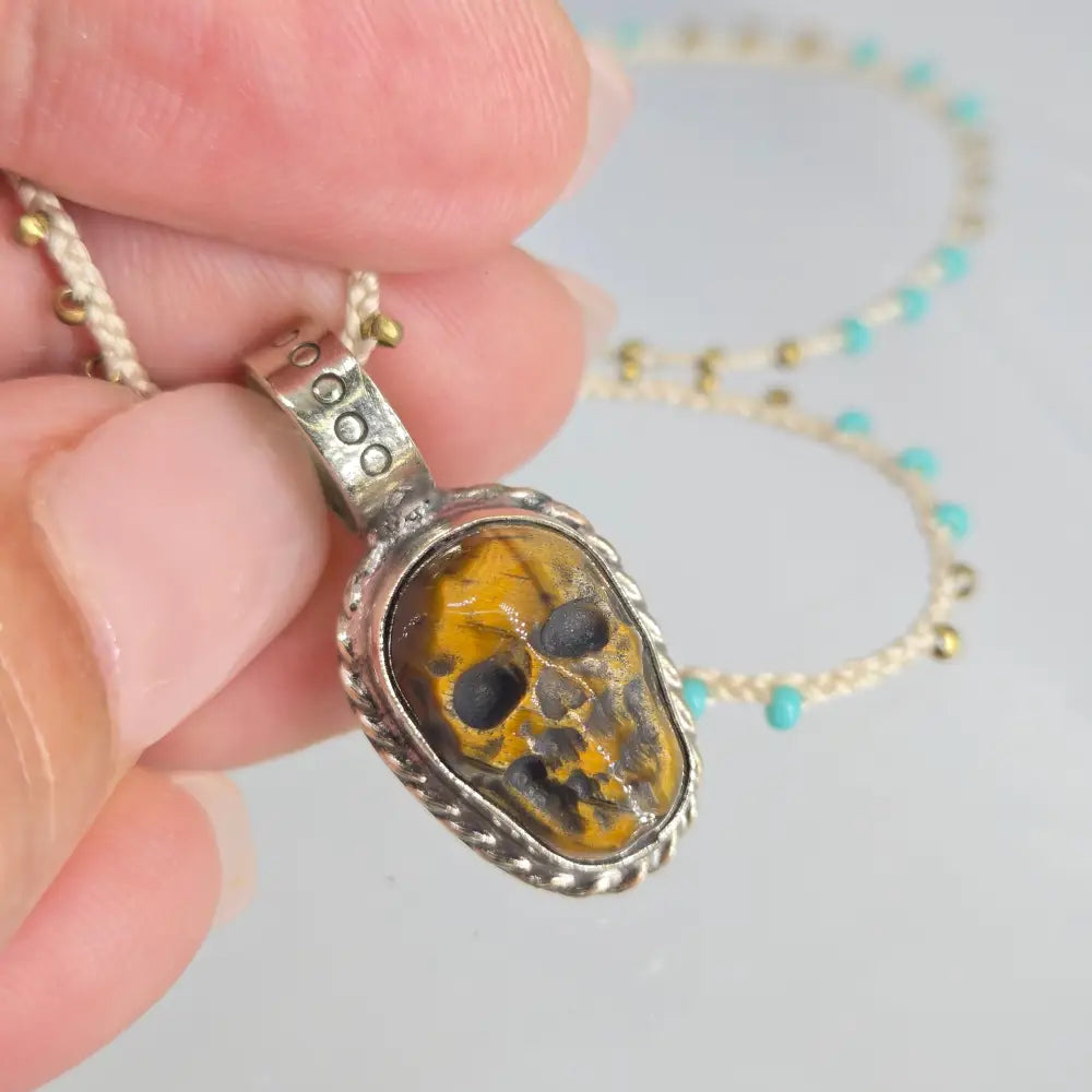 ?SKull Candy’ Hand-carved Tiger’s Eye Skull Pendant Necklace - Key West Local Luxe