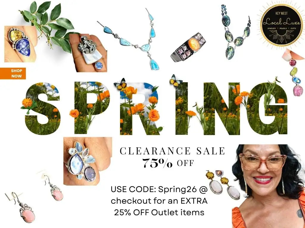 Spring-themed jewelry collection featuring colorful gemstone necklaces, rings, and earrings in silver-toned metal settings.