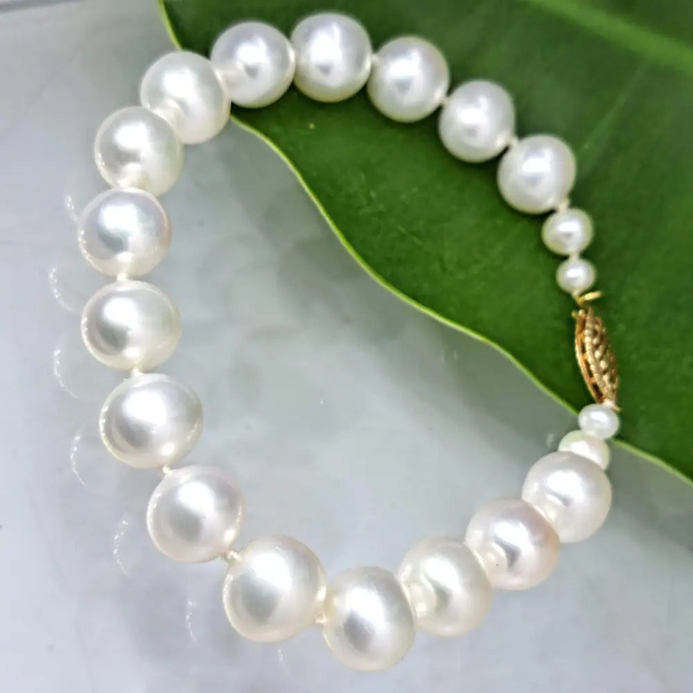 ?THe Classic’ 7.5’’ Bracelet - Pearls 14k - #2 Snow White Near Round Appx. 9.5mm