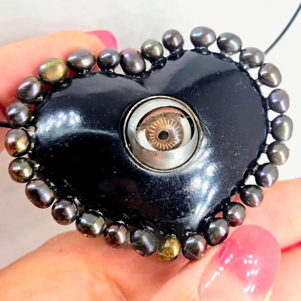 ?VOodoo Love Doll’ Pendant Necklace - Horn Bone Pearls Antique Blinking Doll Eye on 18’’ Cable - Brown Eye/peacock