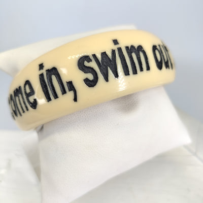 "If Your Ship Doesn't Come In, Swim Out To It!" - New Old Stock, Vintage JKC Resin Bangle